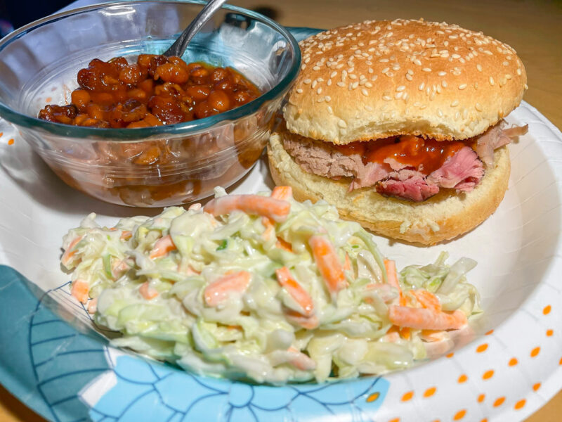 Smoked Pork on a Bun with Beans and Cole Slaw