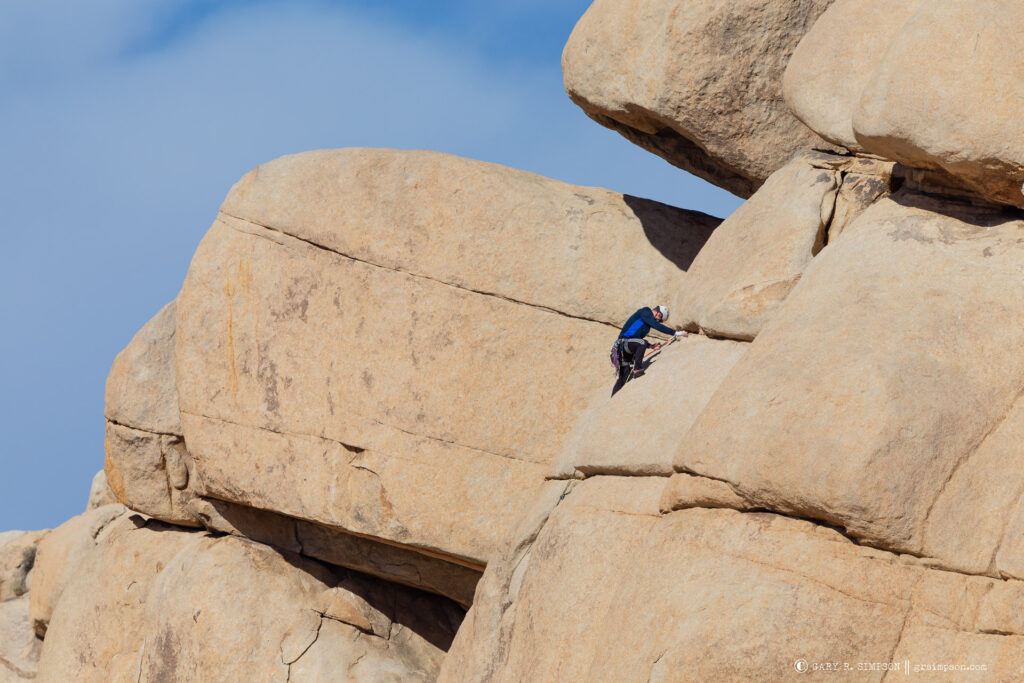Climber in Black, Blue, and White