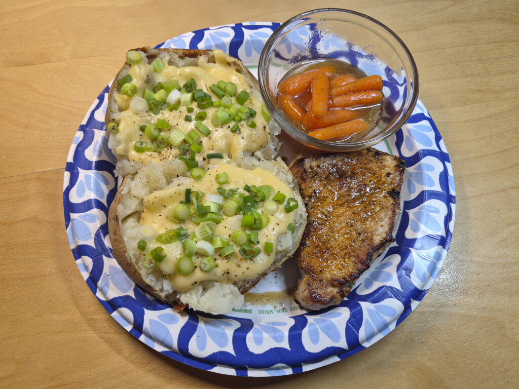 Pork Chop, Baked Potato, and Carrots