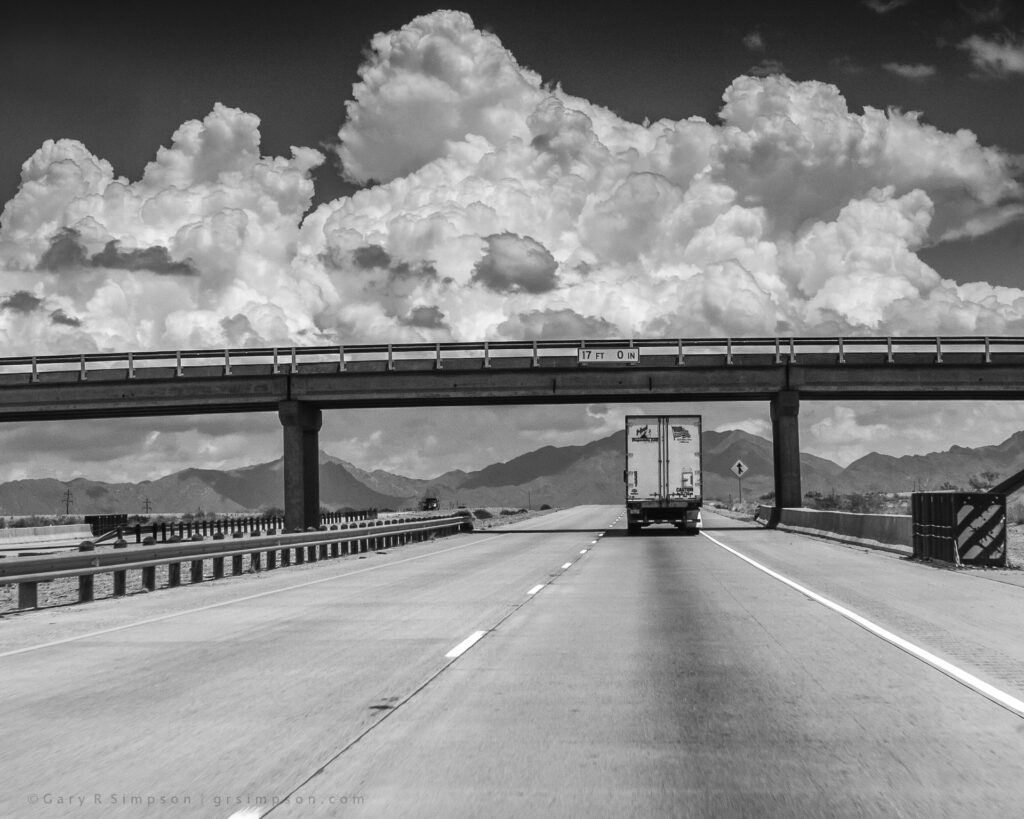 Semi-Truck Under Overpass