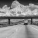 Semi-Truck Under Overpass